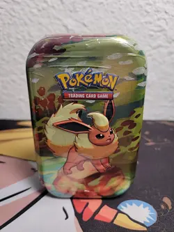 Pokemon - Prismatic Evolutions Flareon Sealed Mini Tin 2 Booster packs - Image 1