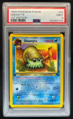 1999 Pokemon Fossil 1st Edition Omanyte #52/62 PSA 9 - Image 1