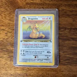 1999 Pokemon Fossil Dragonite #4/62 1st Edition Holo - Image 1