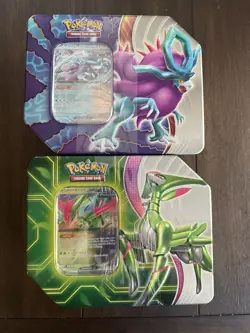 Pokemon TCG: Paradox Clash Tin Set of 2 - Iron Leaves & Walking Wake - Sealed - Image 1