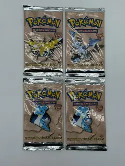 Lot of (4) WOTC Pokemon TCG Fossil 1st Edition Booster Packs SEALED VINTAGE - Image 1