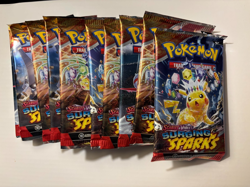 LOT OF 10 Pokemon TCG Surging Sparks Booster Packs NEW SHIPS NEXT DAY - Image 1