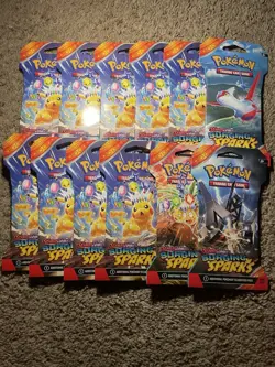 Pokemon Scarlet & Violet Surging Sparks Sleeved Booster Packs 12 Packs Sealed - Image 1
