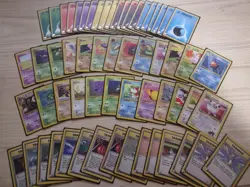 Small Lot of 60 Vintage WOTC Pokemon Cards with Sleeves - Image 1