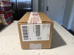 Pokemon Center TCG S&V Surging Sparks Sealed ETB Case (4 ETBs) - Image 1
