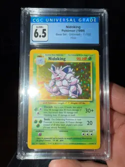 1999 POKEMON BASE SET UNLIMITED #11 NIDOKING-HOLO CGC 6.5 - Image 1