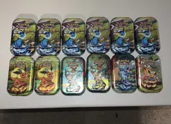 Pokemon TCG Scarlet & Violet Prismatic Evolutions Sealed Mini Tin Lot Of 12 - Image 1