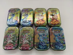 Pokemon TCG Prismatic Evolutions Mini Tin Complete Set - 8 Factory Sealed Tins - Image 1