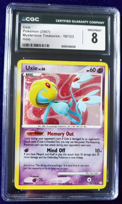 Pokemon TCG 2007 DP Mysterious Treasures Uxie 18/123 Holo CGC 8 NM/Mint - Image 1