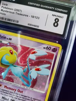 Pokemon TCG 2007 DP Mysterious Treasures Uxie 18/123 Holo CGC 8 NM/Mint - Image 4