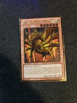 Yu-Gi-Oh! Prime Material Dragon - PGLD-EN065 - Gold Rare - Image 1