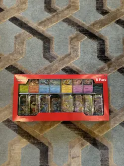 Pokemon TCG: Scarlet & Violet Prismatic Evolutions 8 Pack Mini Tin Set (Costco) - Image 1