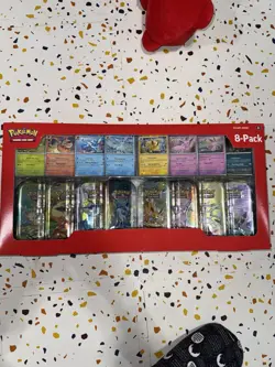 Pokemon TCG: Scarlet & Violet - Prismatic Evolutions 8 Pack Mini Tin Set - Image 1