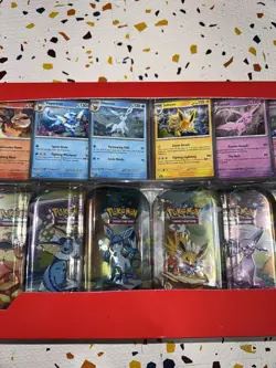 Pokemon TCG: Scarlet & Violet - Prismatic Evolutions 8 Pack Mini Tin Set - Image 3