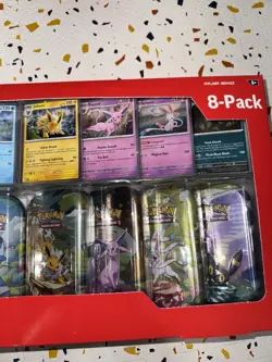 Pokemon TCG: Scarlet & Violet - Prismatic Evolutions 8 Pack Mini Tin Set - Image 4