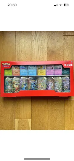 Pokemon TCG: Scarlet & Violet Prismatic Evolutions 8 Pack Mini Tin Set (Costco) - Image 1