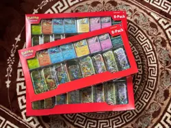 Pokemon TCG: Scarlet & Violet Prismatic Evolutions 8 Pack Mini Tin Set Costco x5 - Image 1