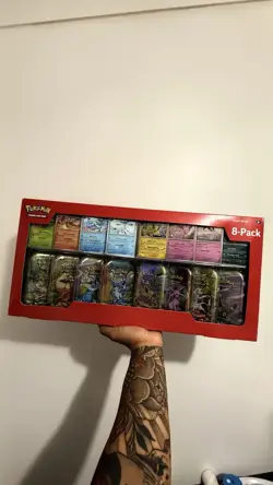 Pokemon TCG: Scarlet & Violet Prismatic Evolutions 8 Pack Mini Tin Set (Costco) - Image 1