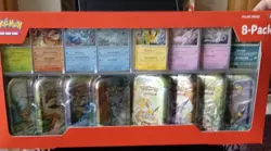 Pokemon TCG: Scarlet & Violet Prismatic Evolutions 8 Pack Mini Tin Set (Costco) - Image 1