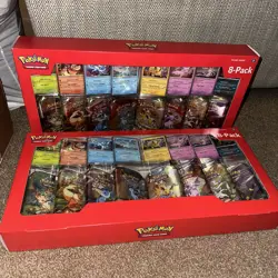 Pokemon TCG: Scarlet & Violet Prismatic Evolutions 8 Pack Mini Tin Set x2 - Image 1