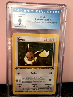 Eevee 1st Edition 2000 Team Rocket #55 Pokemon Card - CGC 9 - Image 1