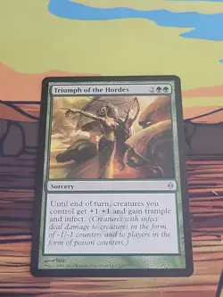 Triumph of the Hordes New Phyrexia Regular - Image 1