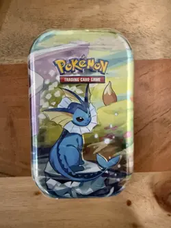 Pokemon TCG Vaporeon Mini Tin Prismatic Evolutions - Factory Sealed Unopened - Image 1