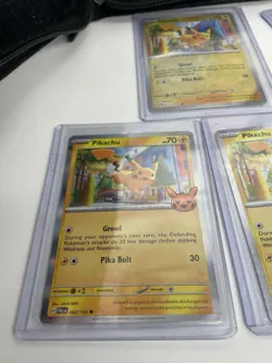 Pokemon TCG Pikachu card lot with assortment of Trick-or-Trade cards and binder - Image 2