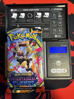 22.60g HEAVY - Pokemon TCG M-E Phantasmal Flames Booster Pack Sealed / Semi GoDU - Image 1