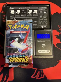 22.27g HEAVY - Pokemon TCG S&V Surging Sparks Booster Pack Sealed / Semi GoDU - Image 1