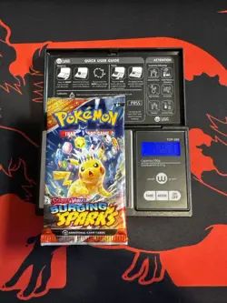 22.51g HEAVY - Pokemon TCG S&V Surging Sparks Booster Pack Sealed / Semi GoDU - Image 1
