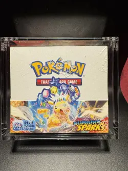 Surging Sparks Booster Box Sealed and In Acrylic Case Pokemon TCG - Image 1