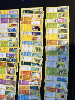 Pokemon TCG Lot 120+ Cards w/ Charizard Tin - Image 4