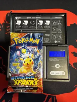 22.50g HEAVY - Pokemon TCG S&V Surging Sparks Booster Pack Sealed / Semi GoDU - Image 1