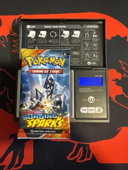 22.60g HEAVY - Pokemon TCG S&V Surging Sparks Booster Pack Sealed / Semi GoDU - Image 1