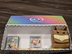 Pokemon Prismatic Evolutions Box w/ Promo Card, Playmat, Sleeves and Deck Box - Image 1