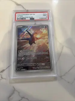 2024 Pokemon Surging Sparks Latios Illustration Rare #203/191 - PSA 9 Mint” - Image 1