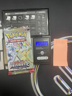 GOD PACKU 20.82g VERY HEAVY Prismatic Evolutions Pokemon Sealed Booster Pack New - Image 1