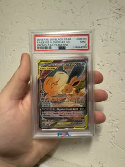 Pokemon Eevee & Snorlax 2019 SM Black Star Promo Tag Team GX SM169 PSA 9 - Image 1
