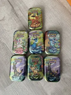 Pokemon TCG Prismatic Evolutions Lot Of 7 Sealed Mini Tins. Ships Fast! - Image 1