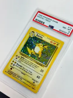 1999 POKEMON BASE SET UNLIMITED #14 RAICHU-HOLO PSA 8 - Image 1