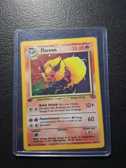 1999 POKEMON FLAREON 1ST EDITION JUNGLE HOLO RARE 3/64 LP - Image 1