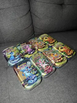 Pokemon TCG Prismatic Evolutions Lot of 8 Sealed Mini Tins - Image 1