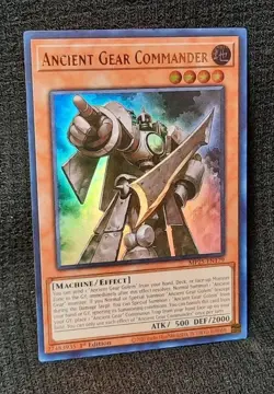 Ancient Gear Commander *ULTRA RARE* MP25-EN179 1st Edition NM | 2025 MEGA TIN - Image 1