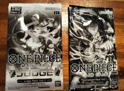 One piece Vol 1 tournament pack and Vol 1 Judge pack: First Promo Packs Sealed - Image 1