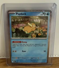 Pokemon TCG Psyduck MEP 007 Black Star Promo Cosmos Holo Promo Rare - Image 1