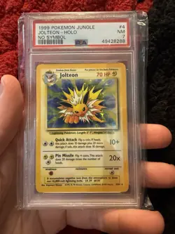 PSA 7 Jolteon Holo 4/64 No Symbol Jungle 1999 Pokemon TCG Card - Image 1
