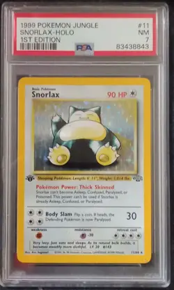 Pokemon Snorlax 1st Edition Holo Jungle Card 11/64 PSA 7 (1999) - Image 1