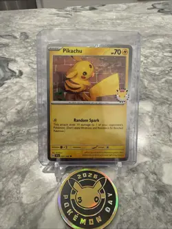 Pikachu 051/162 Pokemon Day 2026 - Anniversary Stamped NM With coin - Image 1