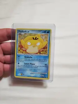 Pokemon TCG Psyduck 87/127 Platinum, Non Holo English 2009 Komiya LP - Image 1
